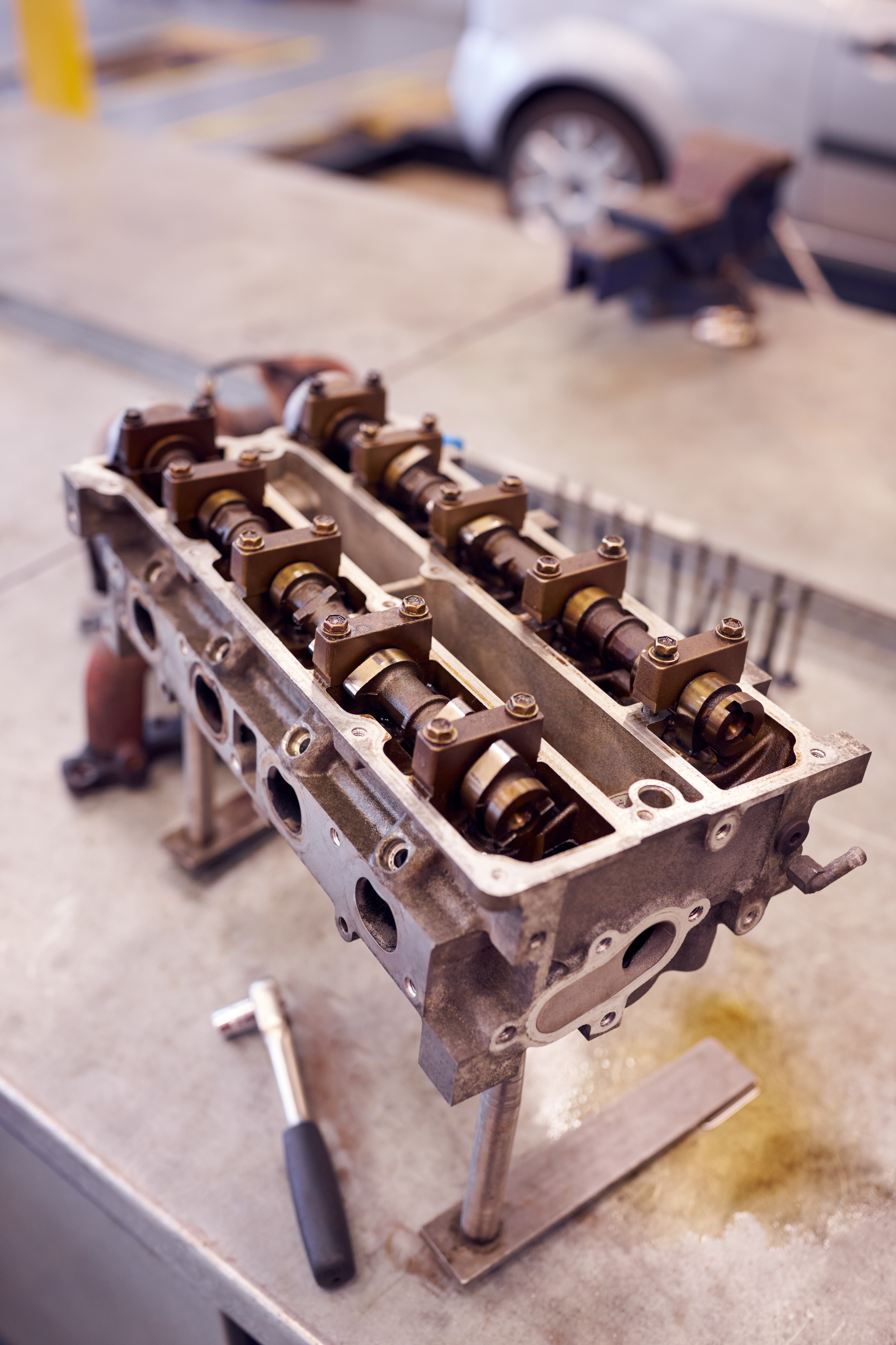 Engine Block On Workbench In Garage Waiting To Be Worked On Engine Block On Workbench In Garage Waiting To Be Worked On