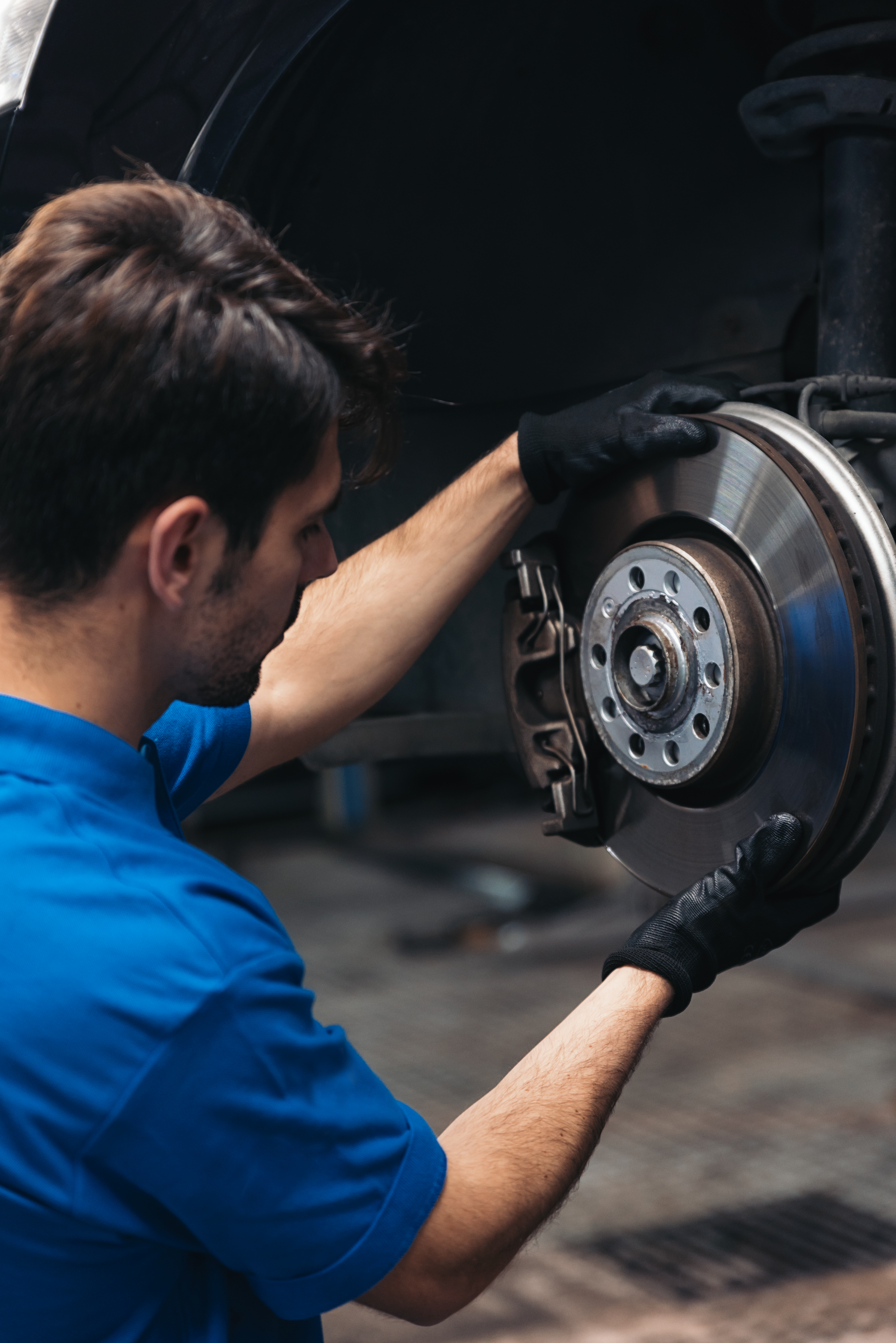 Professional Car Mechanic working. Professional Car Mechanic working in garage.